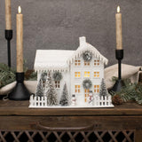 Ragon House 8" White Snow Cover Lighted Farmhouse with Snowmen Christmas Village House